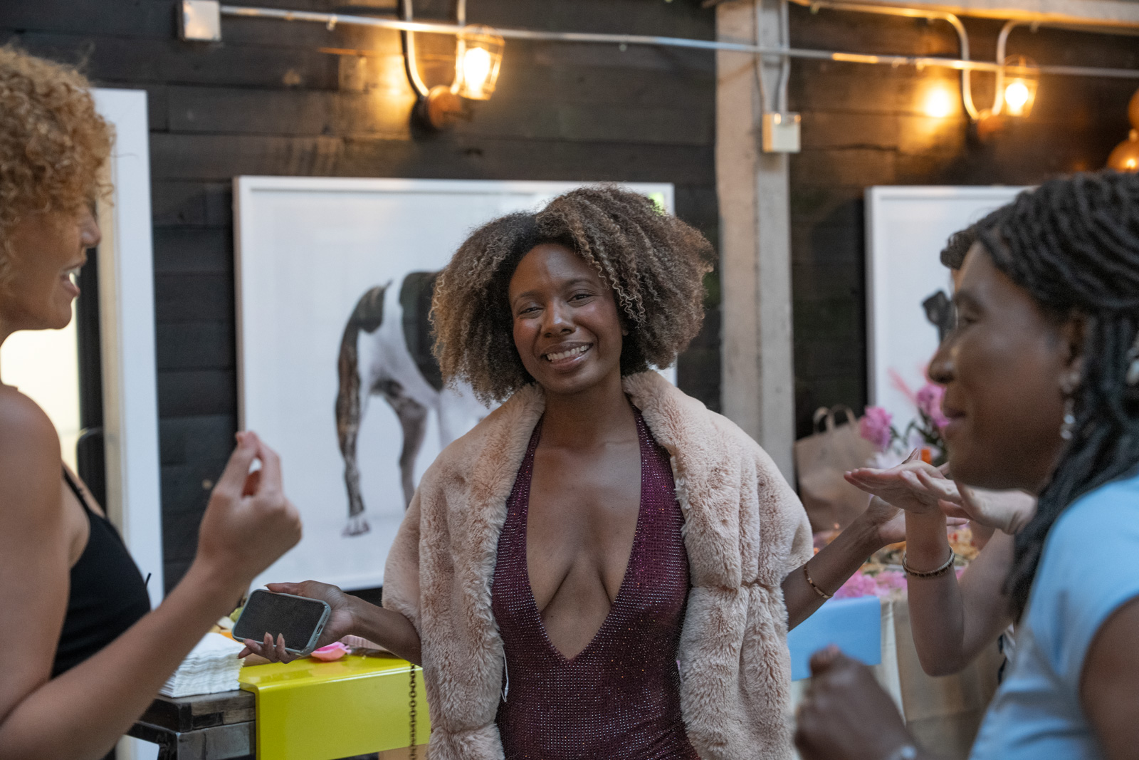 Guests celebrating a milestone birthday inside Historic Dancehall.