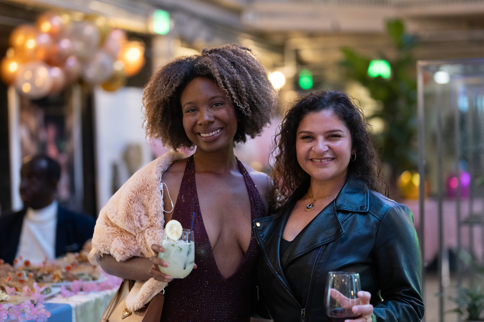 Guests smiling during a private celebration in the DTLA venue.